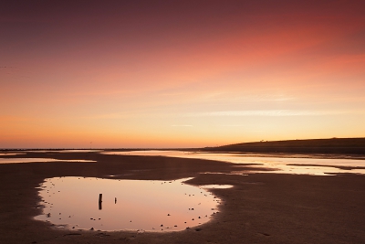 Prachtige zonsondergang op 't Wad bij Hollum - Ameland op 2 juni 2011. Door gebruik te maken van grijsgradatiefilter is ook de voorgrond nog redelijk goed belicht.